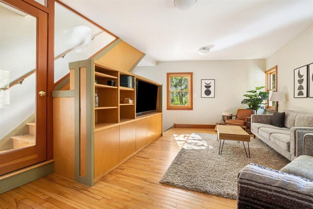6800 Harbert Rd, Harbert, MI 49115 - living area with light wood-type flooring and stairs