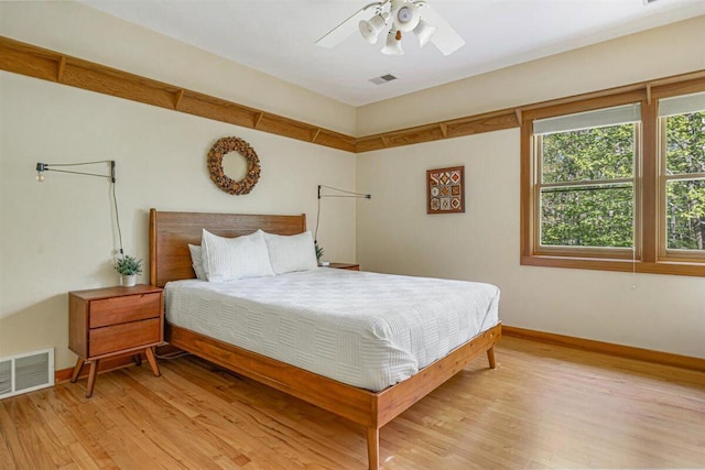 6800 Harbert Rd, Harbert, MI 49115 - bedroom with light wood-style flooring, baseboards, and a ceiling fan