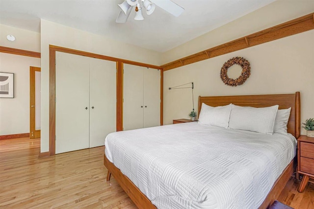 6800 Harbert Rd, Harbert, MI 49115 - bedroom featuring light wood finished floors, multiple closets, and a ceiling fan