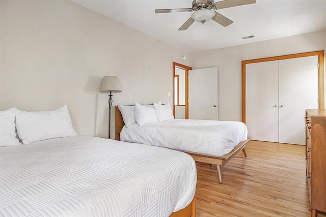 6800 Harbert Rd, Harbert, MI 49115 - bedroom featuring light wood finished floors, a closet, and ceiling fan