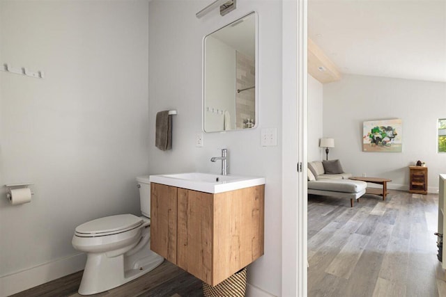 6800 Harbert Rd, Harbert, MI 49115 - bathroom featuring toilet, wood finished floors, vanity, and baseboards