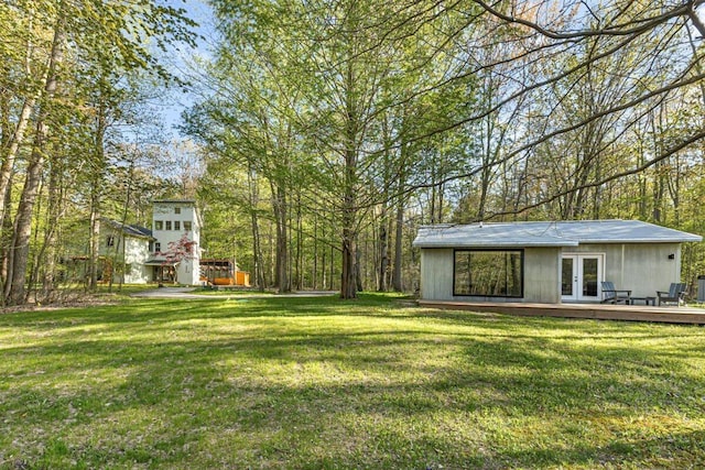 6800 Harbert Rd, Harbert, MI 49115 - view of grassy yard with french doors and a deck