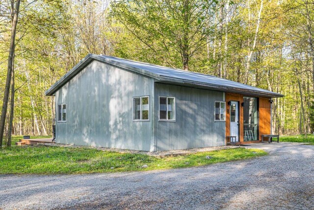 6800 Harbert Rd, Harbert, MI 49115 - view of outdoor structure featuring a forest view
