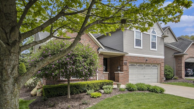 4607 Spring Mountain Dr, Brighton, MI 48116 - traditional-style house featuring concrete driveway, an attached garage, brick siding, and a front lawn