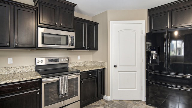 4607 Spring Mountain Dr, Brighton, MI 48116 - kitchen with stainless steel appliances and light stone countertops