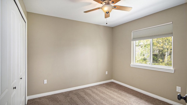 4607 Spring Mountain Dr, Brighton, MI 48116 - carpeted spare room with baseboards and ceiling fan