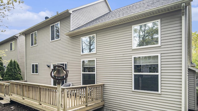 4607 Spring Mountain Dr, Brighton, MI 48116 - rear view of property featuring a wooden deck