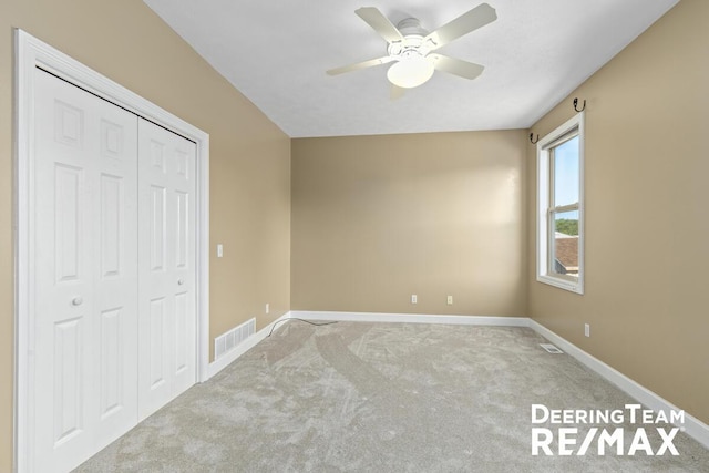 5909 Maple Bend Trl, Allendale, MI 49401 - unfurnished bedroom with carpet floors, a closet, and ceiling fan