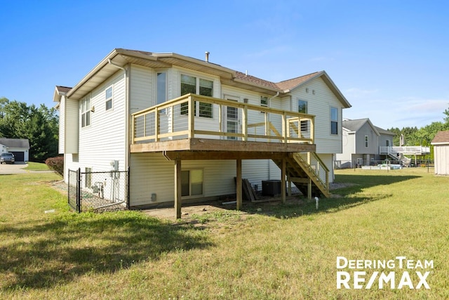 5909 Maple Bend Trl, Allendale, MI 49401 - rear view of house with stairway and a wooden deck