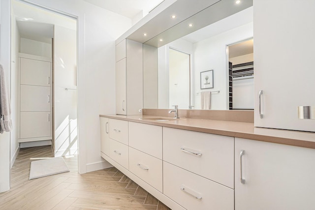 26 W 6th St, Holland, MI 49423 - bathroom with recessed lighting and vanity