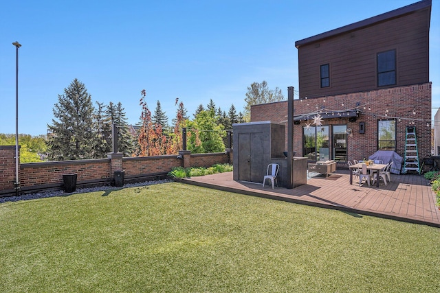 26 W 6th St, Holland, MI 49423 - view of yard featuring a deck