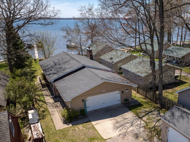 108 Eastbrook Ave, Houghton Lake, MI 48629 - view from above of property with a nearby body of water