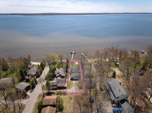 108 Eastbrook Ave, Houghton Lake, MI 48629 - aerial view of property's location featuring a large body of water and property boundaries highlighted