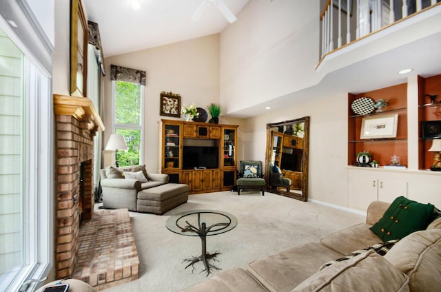 8461 Webster Hills Rd, Dexter, MI 48130 - living area featuring carpet, a brick fireplace, high vaulted ceiling, and baseboards