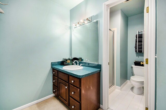 8461 Webster Hills Rd, Dexter, MI 48130 - full bath with a stall shower, toilet, vanity, and tile patterned flooring