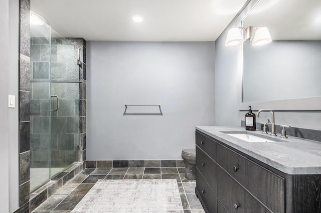 4850 Catamount Trl NE, Ada, MI 49301 - bathroom with toilet, vanity, a stall shower, and recessed lighting