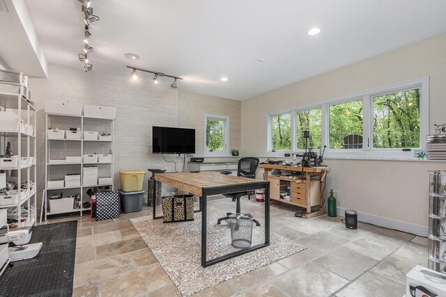4850 Catamount Trl NE, Ada, MI 49301 - office featuring stone tile floors, baseboards, rail lighting, and recessed lighting