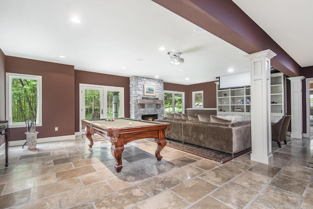 4850 Catamount Trl NE, Ada, MI 49301 - recreation room with stone tile floors, a stone fireplace, baseboards, recessed lighting, and pool table