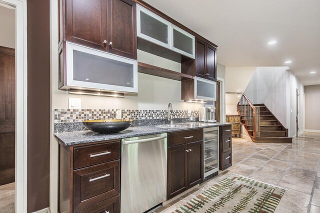 4850 Catamount Trl NE, Ada, MI 49301 - kitchen with stainless steel dishwasher, beverage cooler, a sink, dark brown cabinetry, and recessed lighting