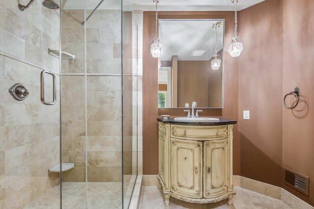4850 Catamount Trl NE, Ada, MI 49301 - bathroom featuring a stall shower and vanity