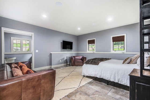 4850 Catamount Trl NE, Ada, MI 49301 - bedroom with recessed lighting, multiple windows, and baseboards