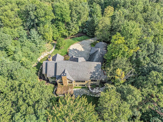 4850 Catamount Trl NE, Ada, MI 49301 - aerial view of property and surrounding area with a heavily wooded area