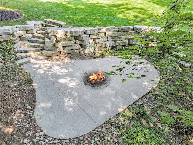 4850 Catamount Trl NE, Ada, MI 49301 - view of green lawn featuring an outdoor fire pit