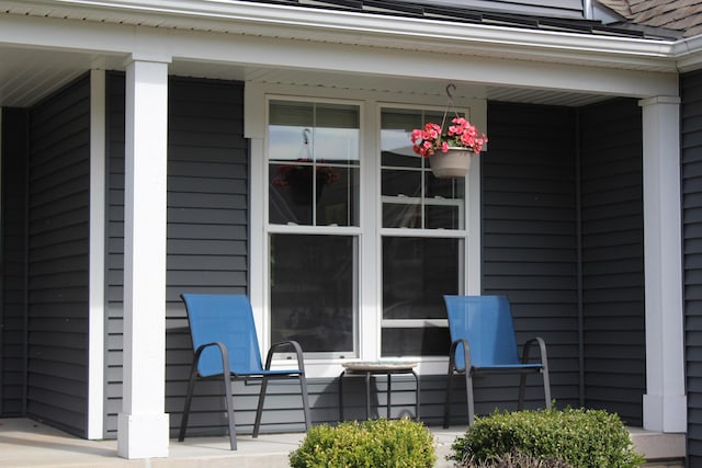 16894 Arbor Way Dr, Nunica, MI 49448 - view of property exterior with covered porch