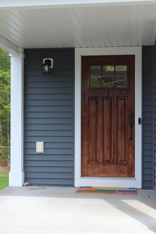 16894 Arbor Way Dr, Nunica, MI 49448 - entrance to property featuring a porch