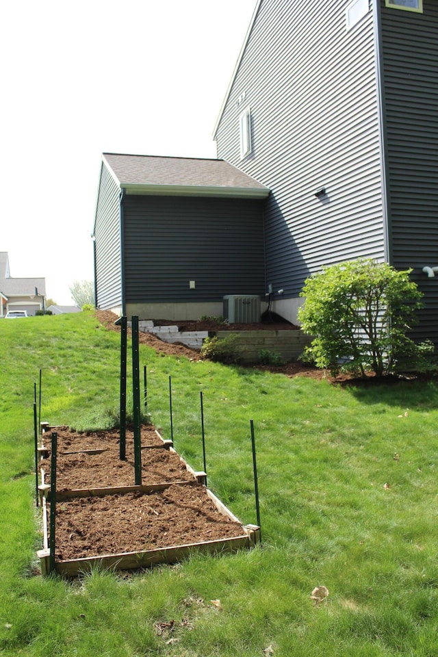 16894 Arbor Way Dr, Nunica, MI 49448 - view of grassy yard featuring central air condition unit
