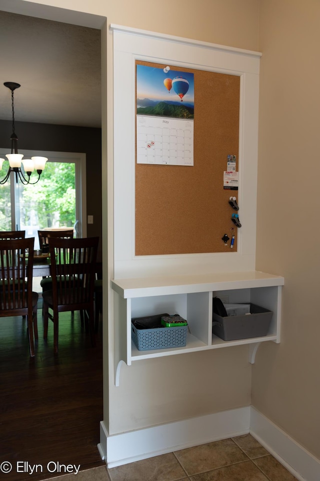16894 Arbor Way Dr, Nunica, MI 49448 - mudroom with a chandelier and baseboards