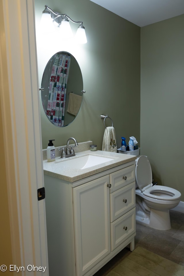 16894 Arbor Way Dr, Nunica, MI 49448 - bathroom with toilet, vanity, and wood finished floors