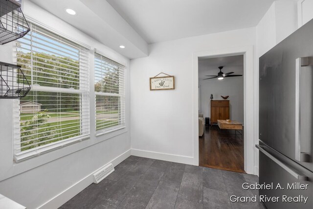 empty room with baseboards, recessed lighting, and ceiling fan