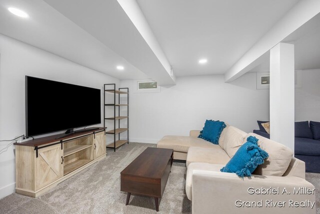 carpeted living room with baseboards and recessed lighting