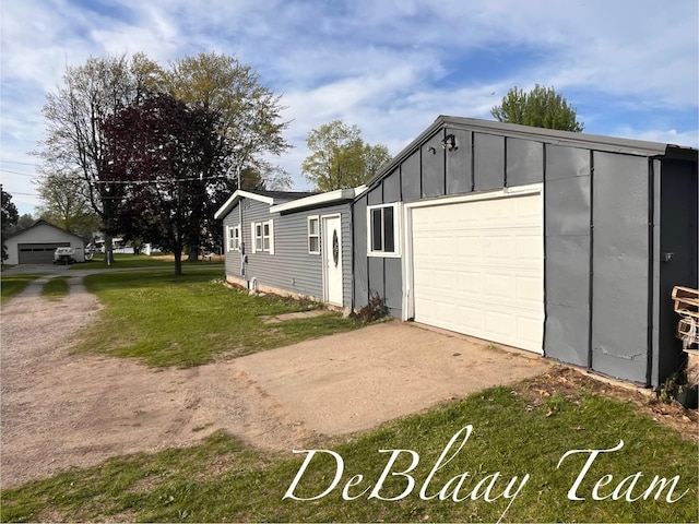 6061 Cutler Rd, Lakeview, MI 48850 - garage featuring concrete driveway