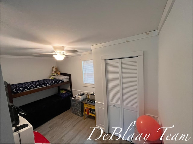 6061 Cutler Rd, Lakeview, MI 48850 - bedroom featuring light wood-style flooring, a closet, and a ceiling fan