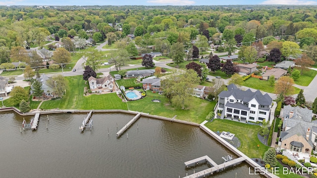 833 Allen Dr, Holland, MI 49423 - aerial view of residential area with a nearby body of water and a heavily wooded area