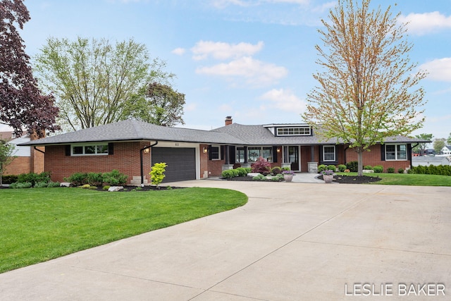 833 Allen Dr, Holland, MI 49423 - ranch-style house with brick siding, a garage, a chimney, driveway, and a front yard