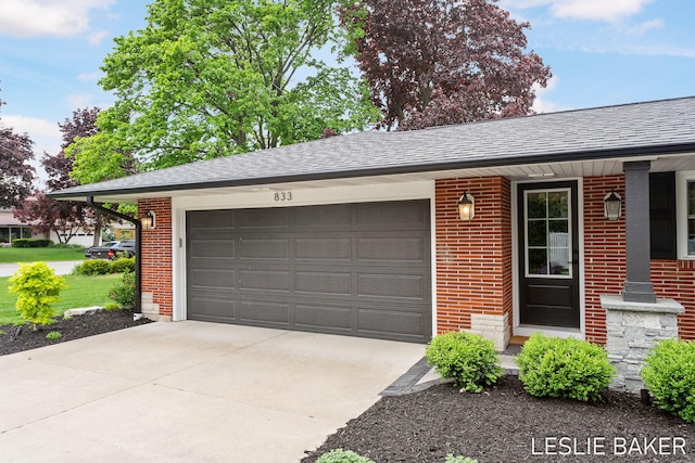 833 Allen Dr, Holland, MI 49423 - garage with concrete driveway
