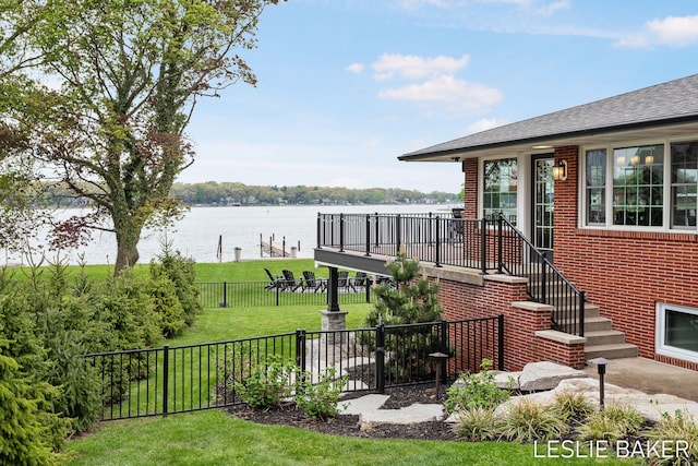 833 Allen Dr, Holland, MI 49423 - view of yard featuring a water view and stairway