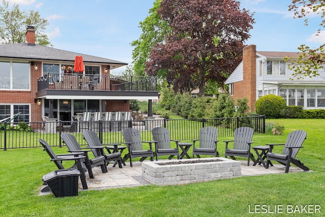 833 Allen Dr, Holland, MI 49423 - view of yard featuring a fire pit and a patio