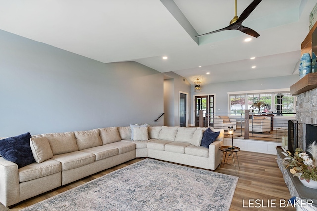 833 Allen Dr, Holland, MI 49423 - living area featuring recessed lighting, a ceiling fan, wood finished floors, and a fireplace