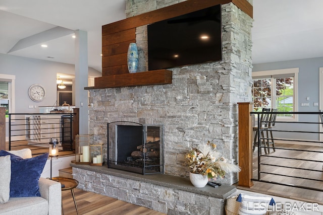 833 Allen Dr, Holland, MI 49423 - living area with wood finished floors and a fireplace