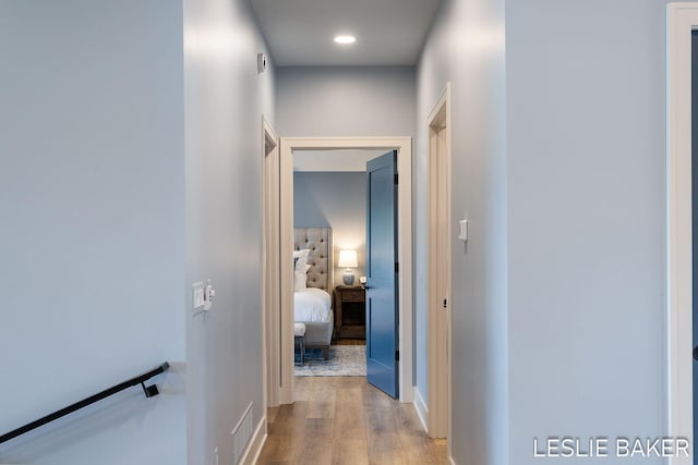 833 Allen Dr, Holland, MI 49423 - corridor with wood finished floors and recessed lighting