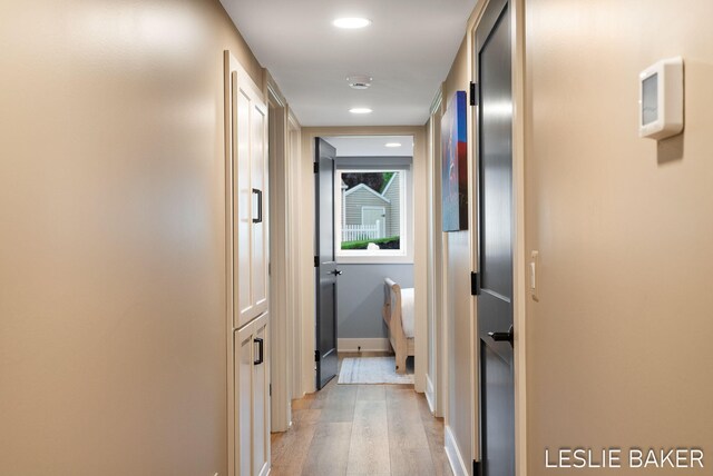 833 Allen Dr, Holland, MI 49423 - corridor with light wood finished floors, baseboards, and recessed lighting