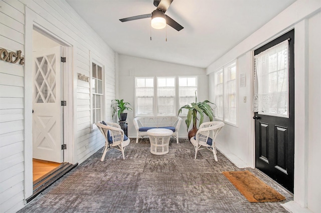 620 N Lakeshore Dr, Ludington, MI 49431 - sunroom / solarium featuring lofted ceiling and carpet floors