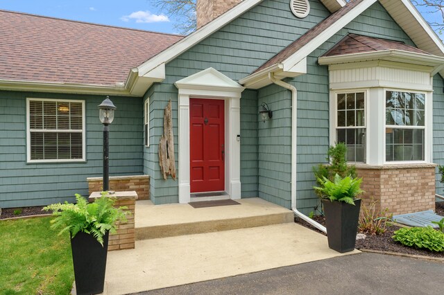 46132 86th Ave, Decatur, MI 49045 - doorway to property with a shingled roof and a chimney