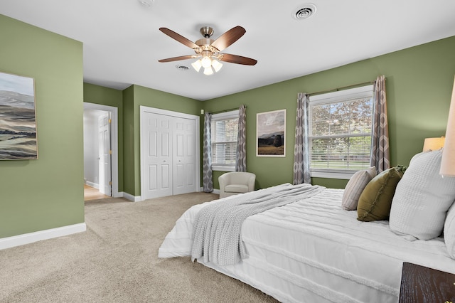 46132 86th Ave, Decatur, MI 49045 - carpeted bedroom featuring baseboards, a closet, and a ceiling fan