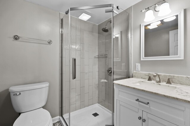 46132 86th Ave, Decatur, MI 49045 - full bath featuring a shower stall, toilet, and vanity