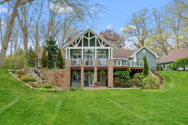 46132 86th Ave, Decatur, MI 49045 - back of house with a yard, brick siding, a chimney, a deck, and a patio area